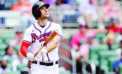 Season opens with Dodgers cashing in